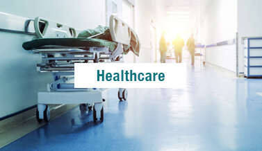 Hospital hallway with a hospital bed